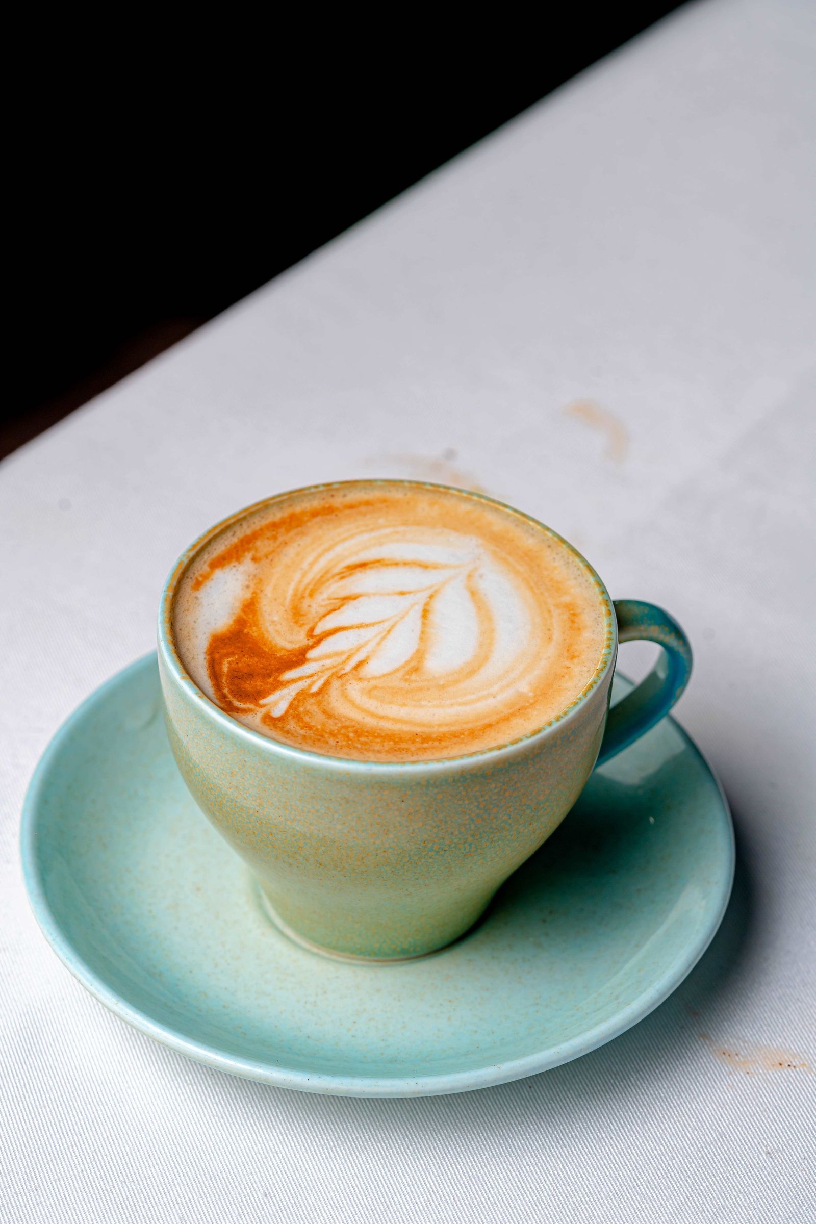 A latte with rosetta latte art